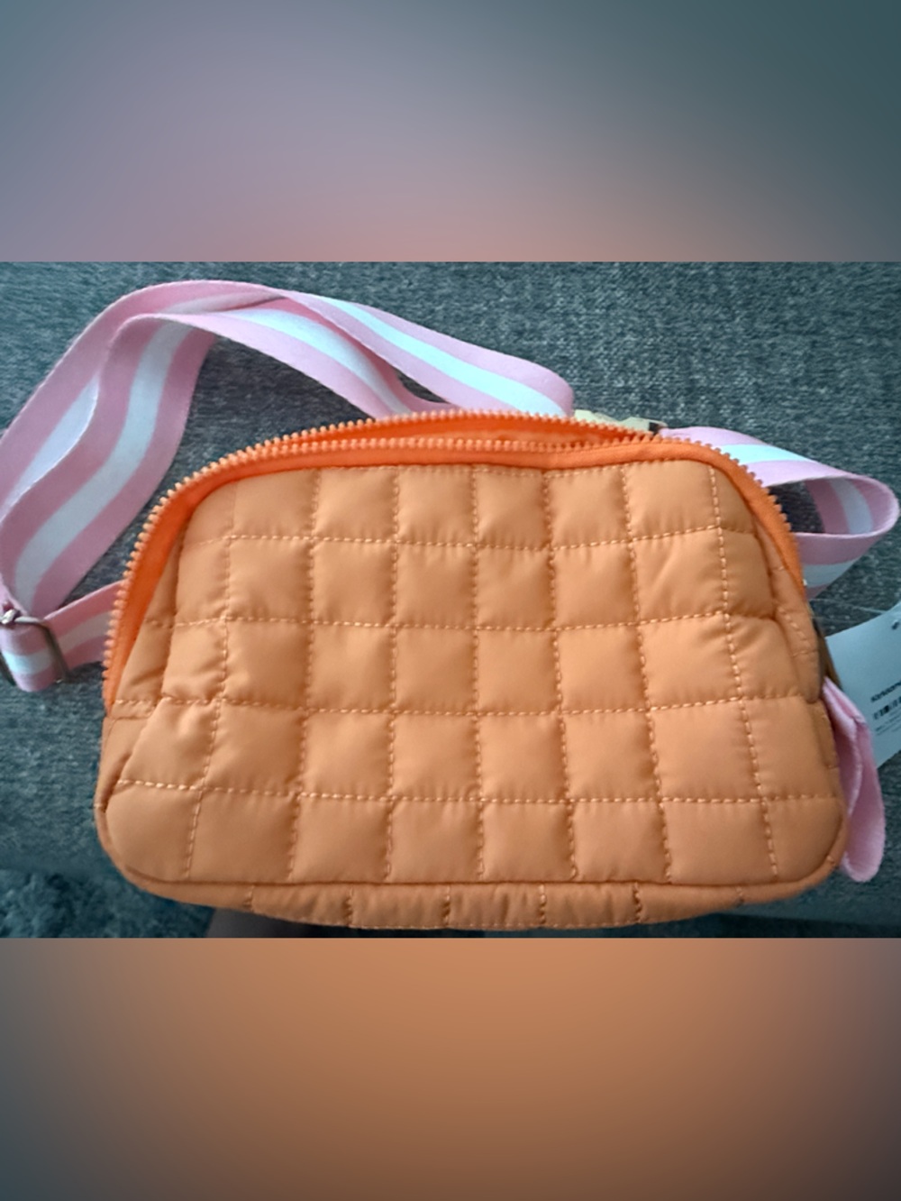 Quilted Orange Crossbody Bag with Pink Stripe Strap